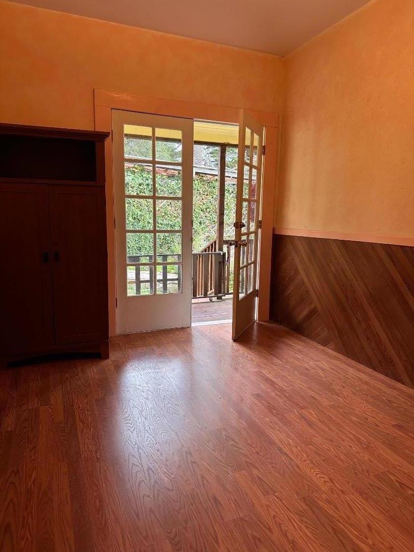 46 Valley View Road Watsonville, CA 95076 - Photo 17 of 55 a view of an empty room with wooden floor and a window