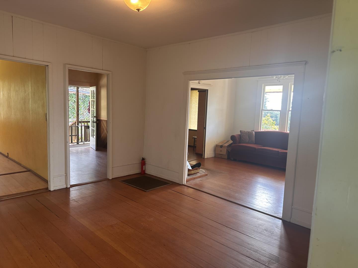 46 Valley View Road Watsonville, CA 95076 - Photo 19 of 55 a view of a livingroom with furniture wooden floor and windows