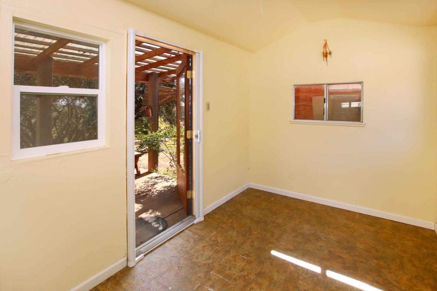 46 Valley View Road Watsonville, CA 95076 - Photo 30 of 55 a picture of a bathroom with a glass door and a window