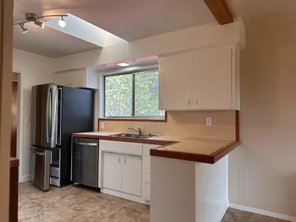 a bathroom with a sink a bathtub and a toilet
