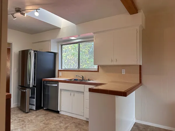 a bathroom with a sink a bathtub and a toilet