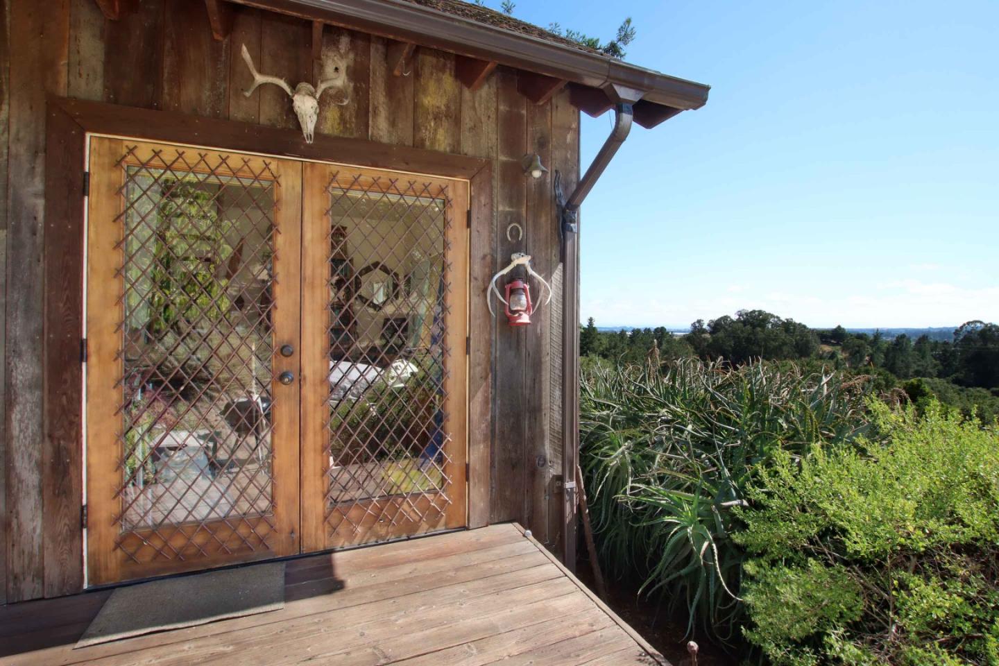 46 Valley View Road Watsonville, CA 95076 - Photo 42 of 55 a view of a house with a tree
