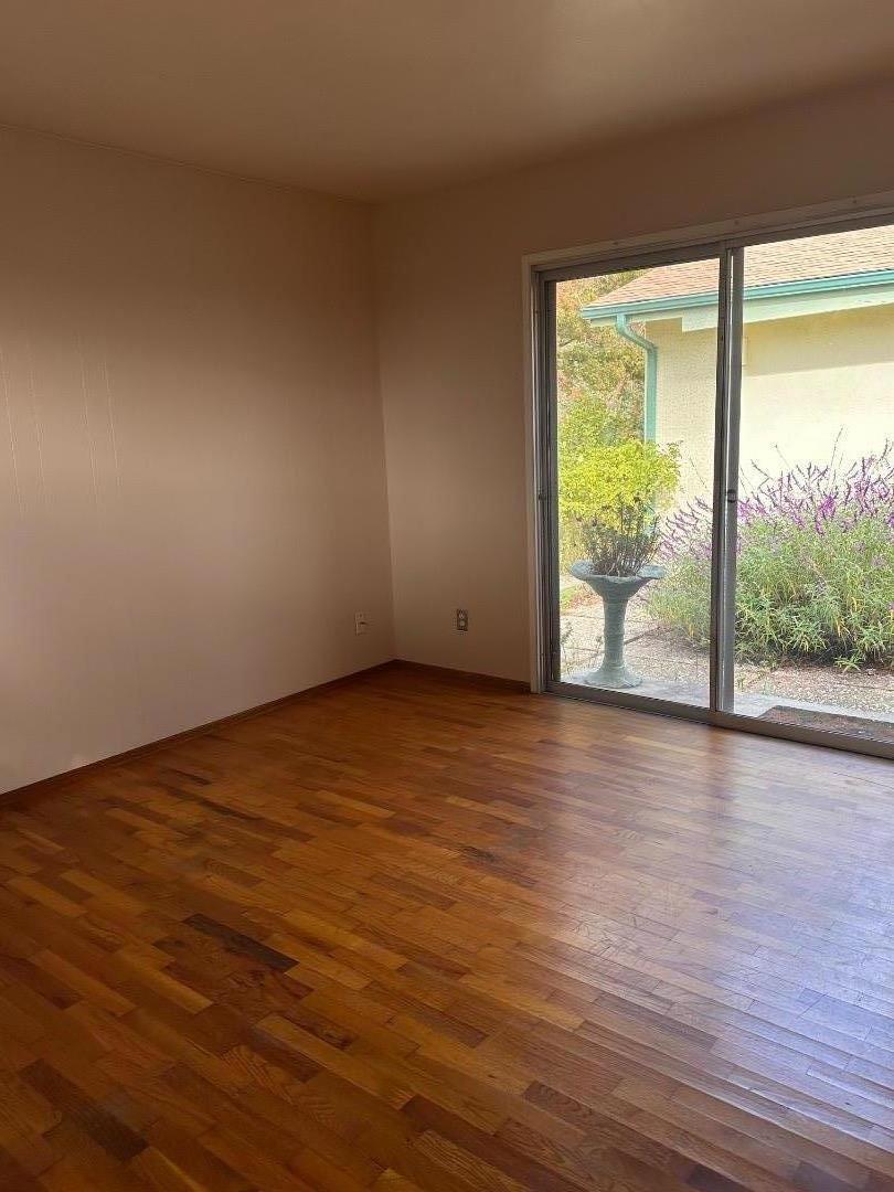 46 Valley View Road Watsonville, CA 95076 - Photo 55 of 55 a view of an empty room with wooden floor and a window