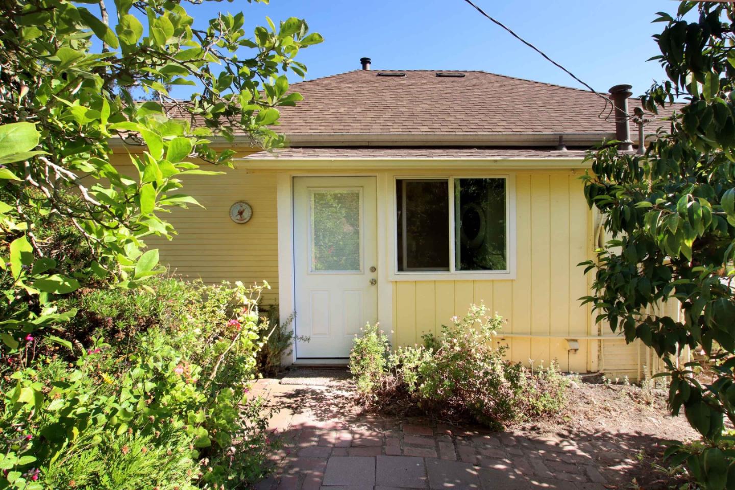 46 Valley View Road Watsonville, CA 95076 - Photo 7 of 55 a front view of a house with a yard