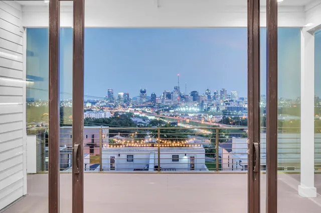 a city view from a balcony