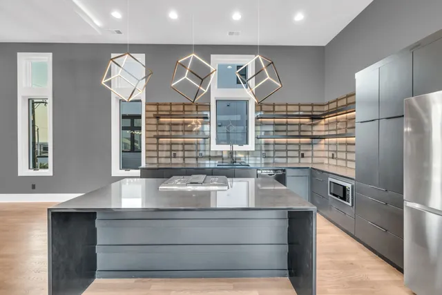 a view of a room with wooden floor and balcony
