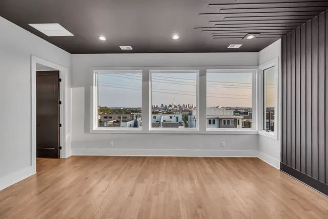 a bathroom with a double vanity sink and mirror