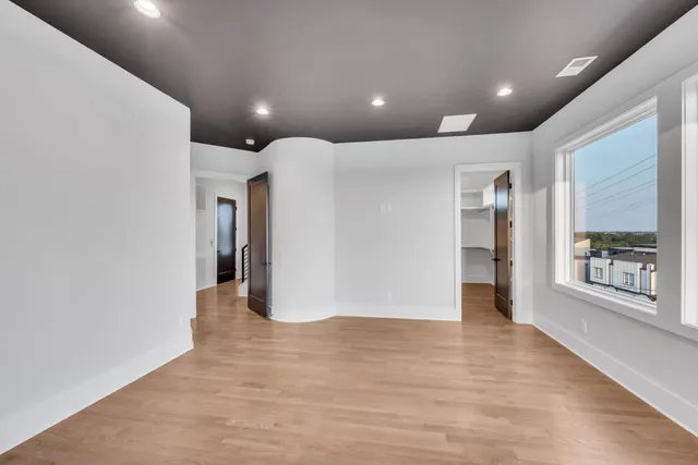 a bathroom with a bathtub and a sink