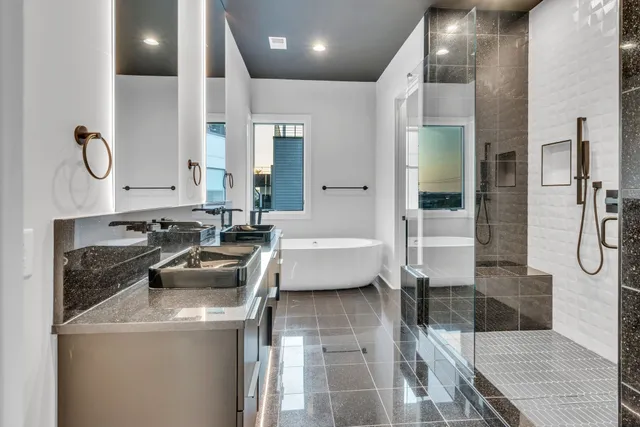 a bathroom with a sink a vanity and a mirror