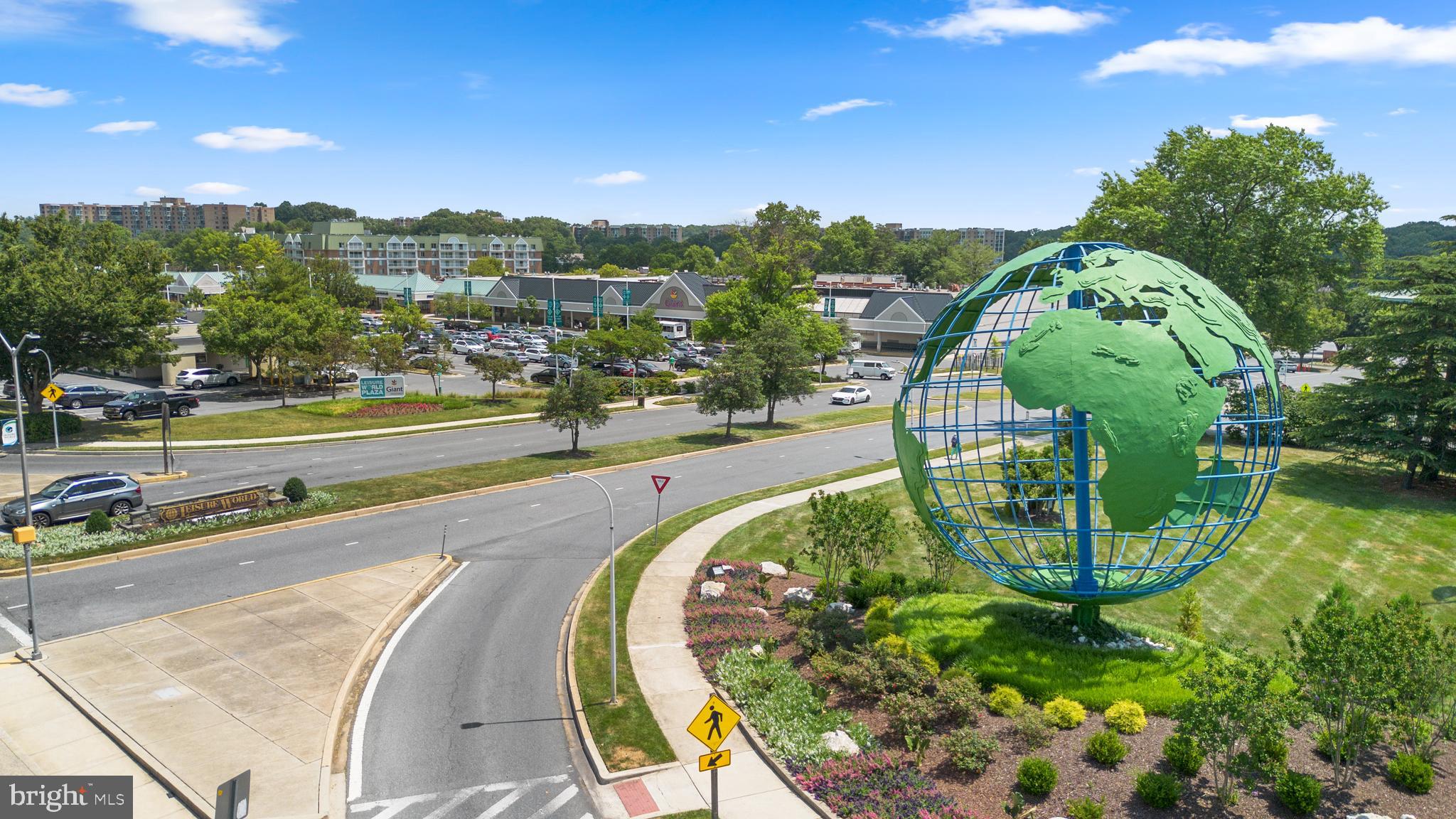 2900 North Leisure World Boulevard, Unit 301 Silver Spring, MD 20906 - Photo 30 of 30 swimming pool view with a garden