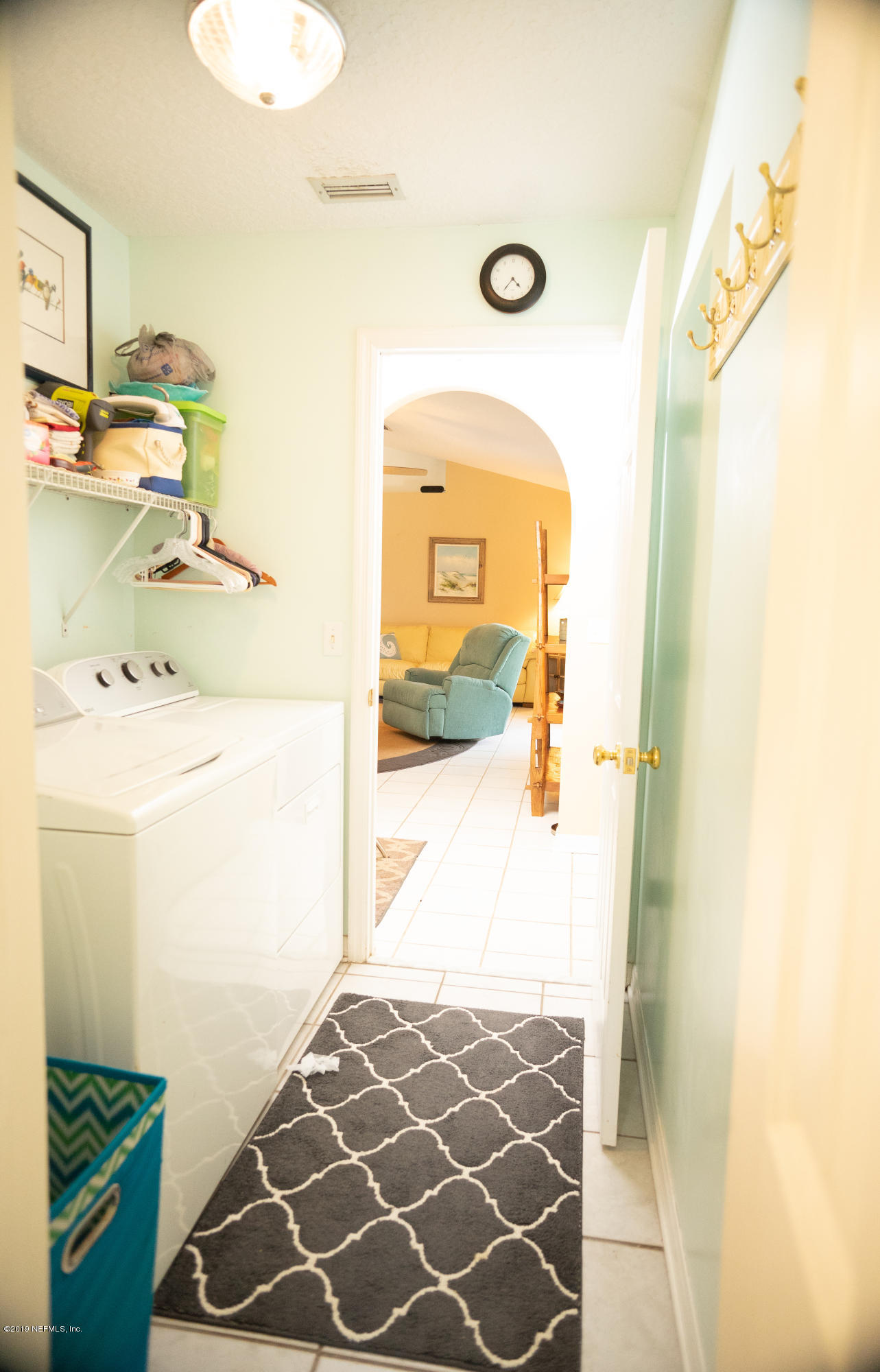 570 Ruba Road St. Augustine, FL 32086 - Photo 13 of 27 a bathroom with a sink and a mirror