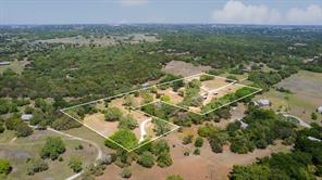 An aerial perspective reveals the vast, tree-dotted acreage with defined property lines, offering serene privacy.