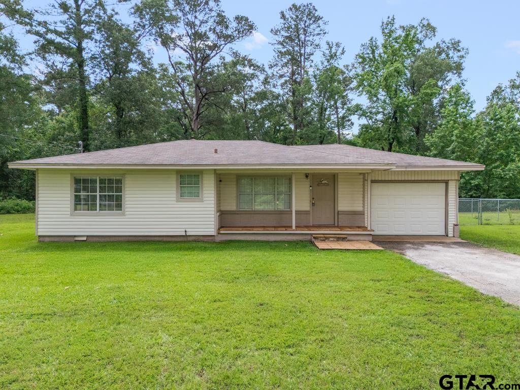 2144 State Highway 155 Gilmer, TX 75644 - Photo 1 of 26 a view of a house with a yard and sitting area