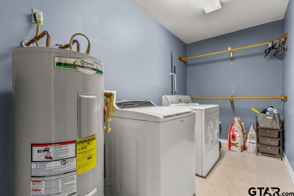 2144 State Highway 155 Gilmer, TX 75644 - Photo 16 of 26 a utility room with dryer and washer