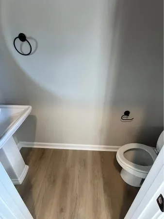 a bathroom with a toilet and a sink