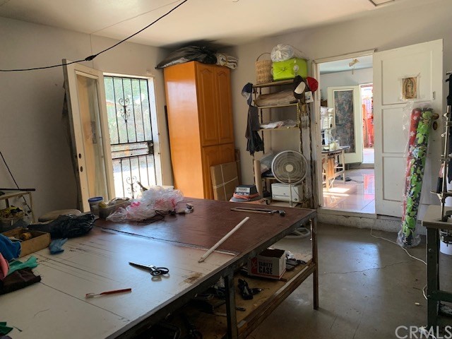 2314 West Alondra Boulevard Compton, CA 90220 - Photo 12 of 15 a view of a workspace with furniture and a window