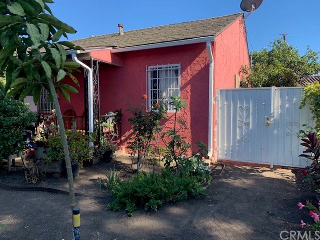 2314 West Alondra Boulevard Compton, CA 90220 - Photo 5 of 15 a front view of a house with a yard