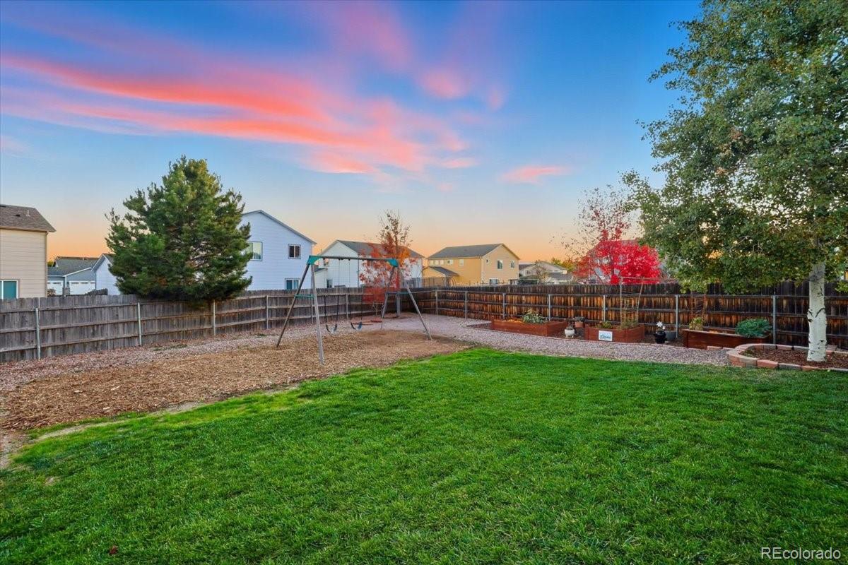 12209 Crystal Downs Road Peyton, CO 80831 - Photo 20 of 37 a view of a street with houses