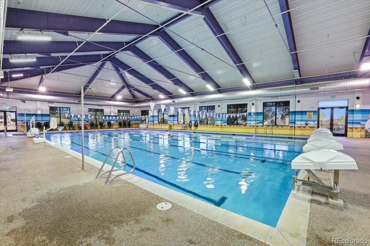 12209 Crystal Downs Road Peyton, CO 80831 - Photo 24 of 37 a view of a swimming pool with an outdoor seating