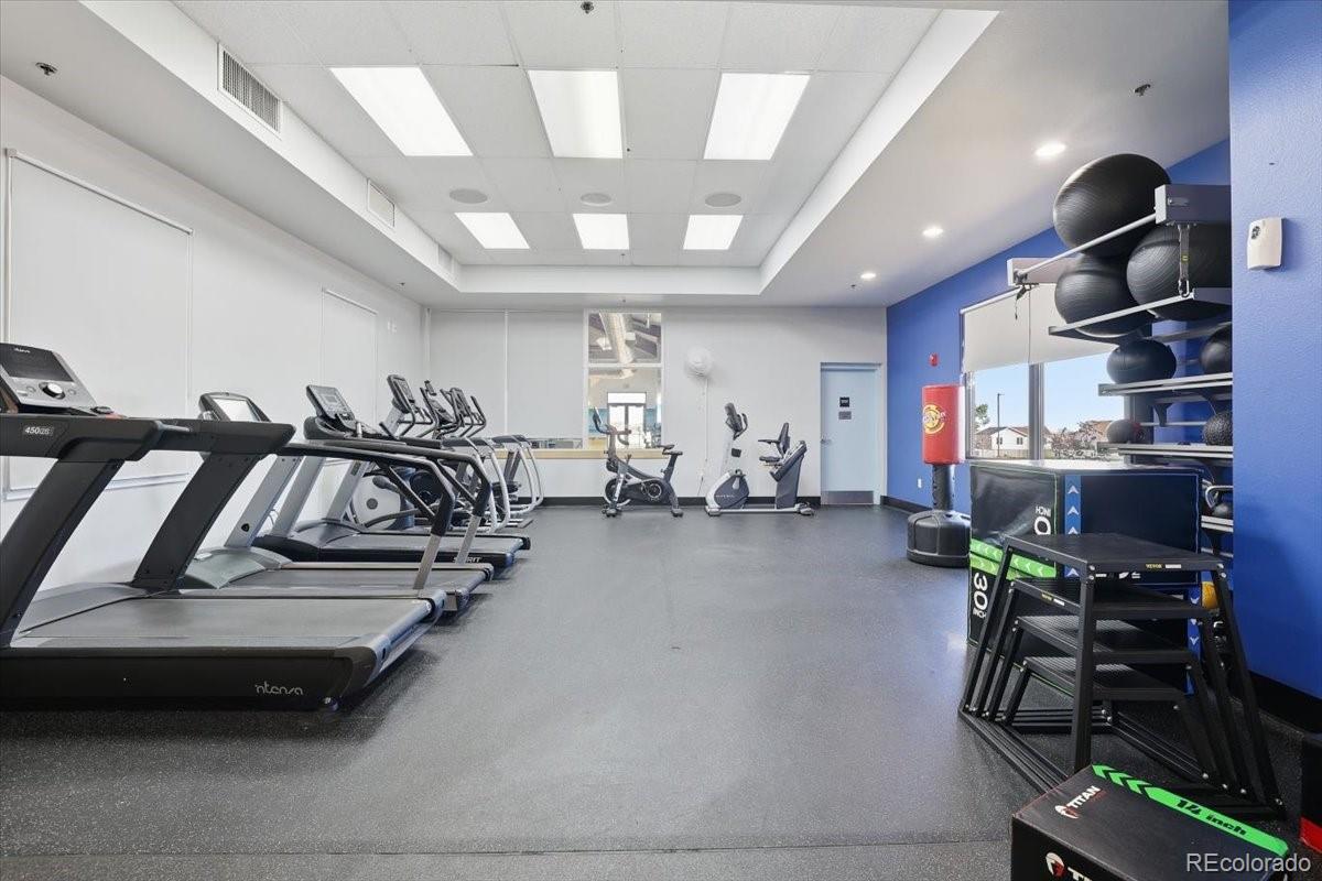 12209 Crystal Downs Road Peyton, CO 80831 - Photo 28 of 37 a view of a room with gym equipment