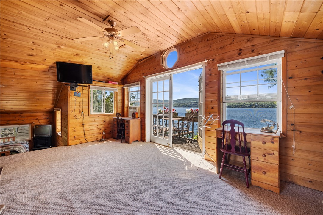 264 East Lake Road Middlesex, NY 14544 - Photo 25 of 50 2ND FLOOR BEDROOM WITH LAKE VIEWS