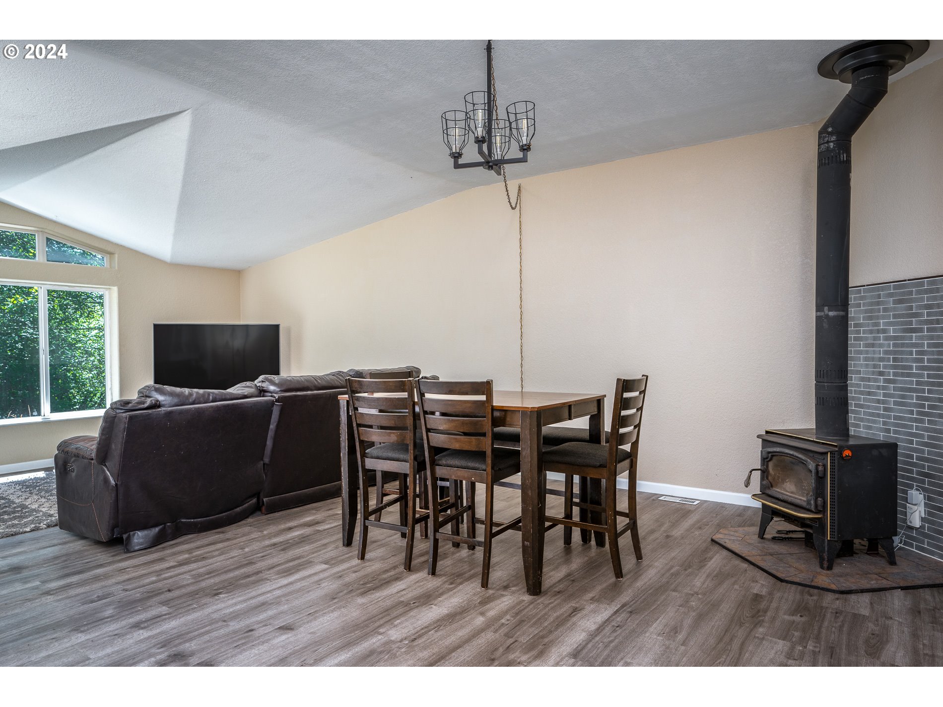 6007 Northeast Lessard Road Camas, WA 98607 - Photo 12 of 48 a living room with furniture and a flat screen tv