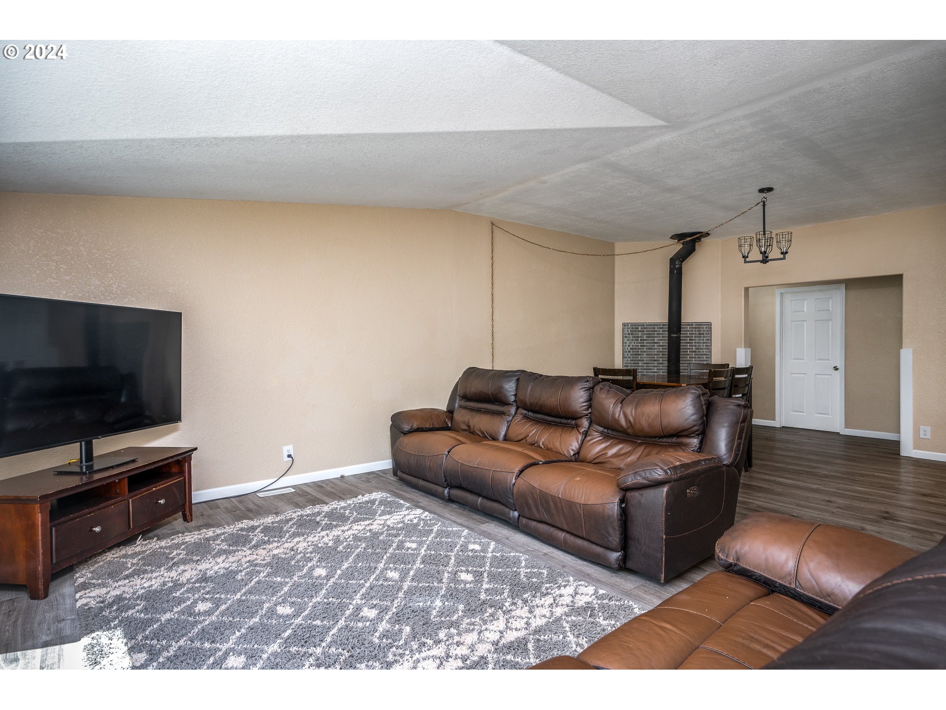 6007 Northeast Lessard Road Camas, WA 98607 - Photo 13 of 48 a living room with furniture and a flat screen tv