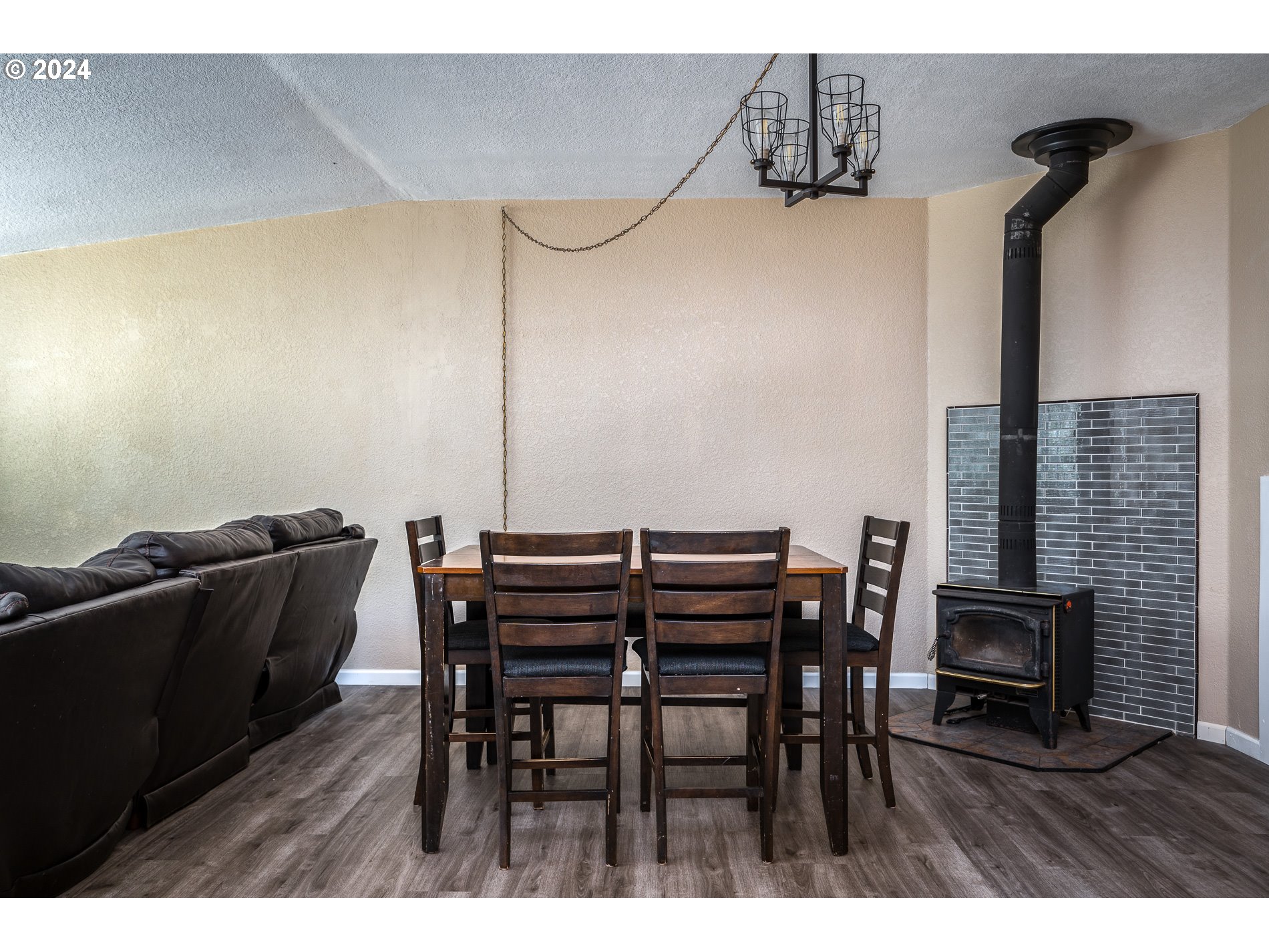 6007 Northeast Lessard Road Camas, WA 98607 - Photo 16 of 48 a view of a dining room with furniture and wooden floor