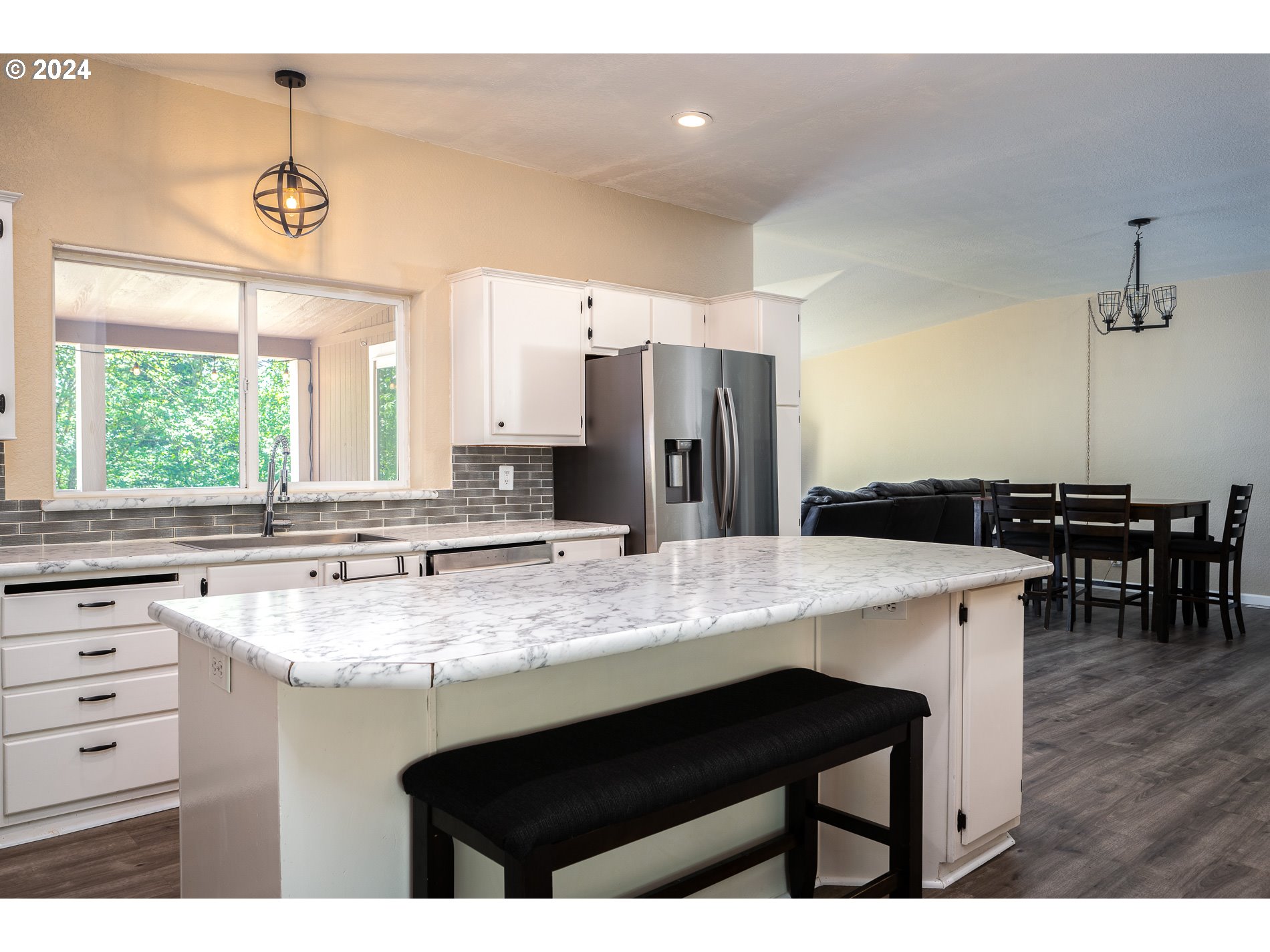 6007 Northeast Lessard Road Camas, WA 98607 - Photo 22 of 48 a kitchen with a center island and cabinets