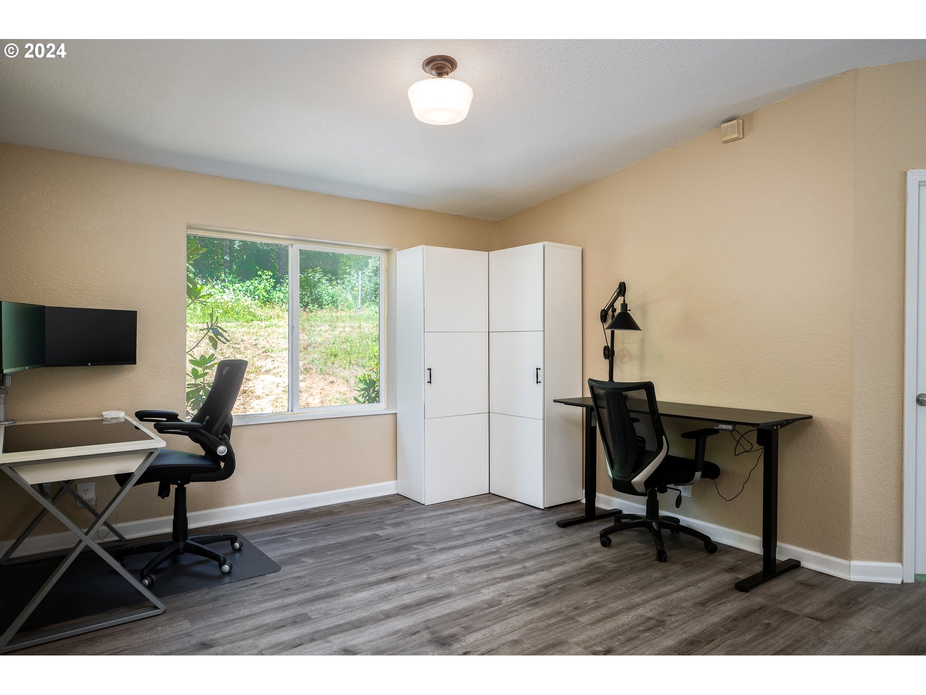 6007 Northeast Lessard Road Camas, WA 98607 - Photo 32 of 48 a view of a workspace with furniture and a window