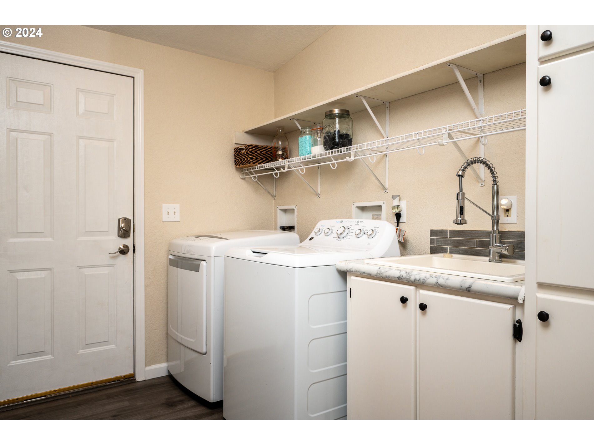 6007 Northeast Lessard Road Camas, WA 98607 - Photo 34 of 48 a kitchen with stainless steel appliances granite countertop a sink a stove and cabinets