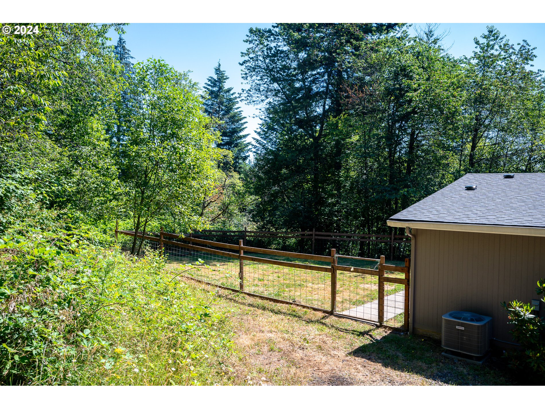 6007 Northeast Lessard Road Camas, WA 98607 - Photo 39 of 48 a view of a backyard and basketball court