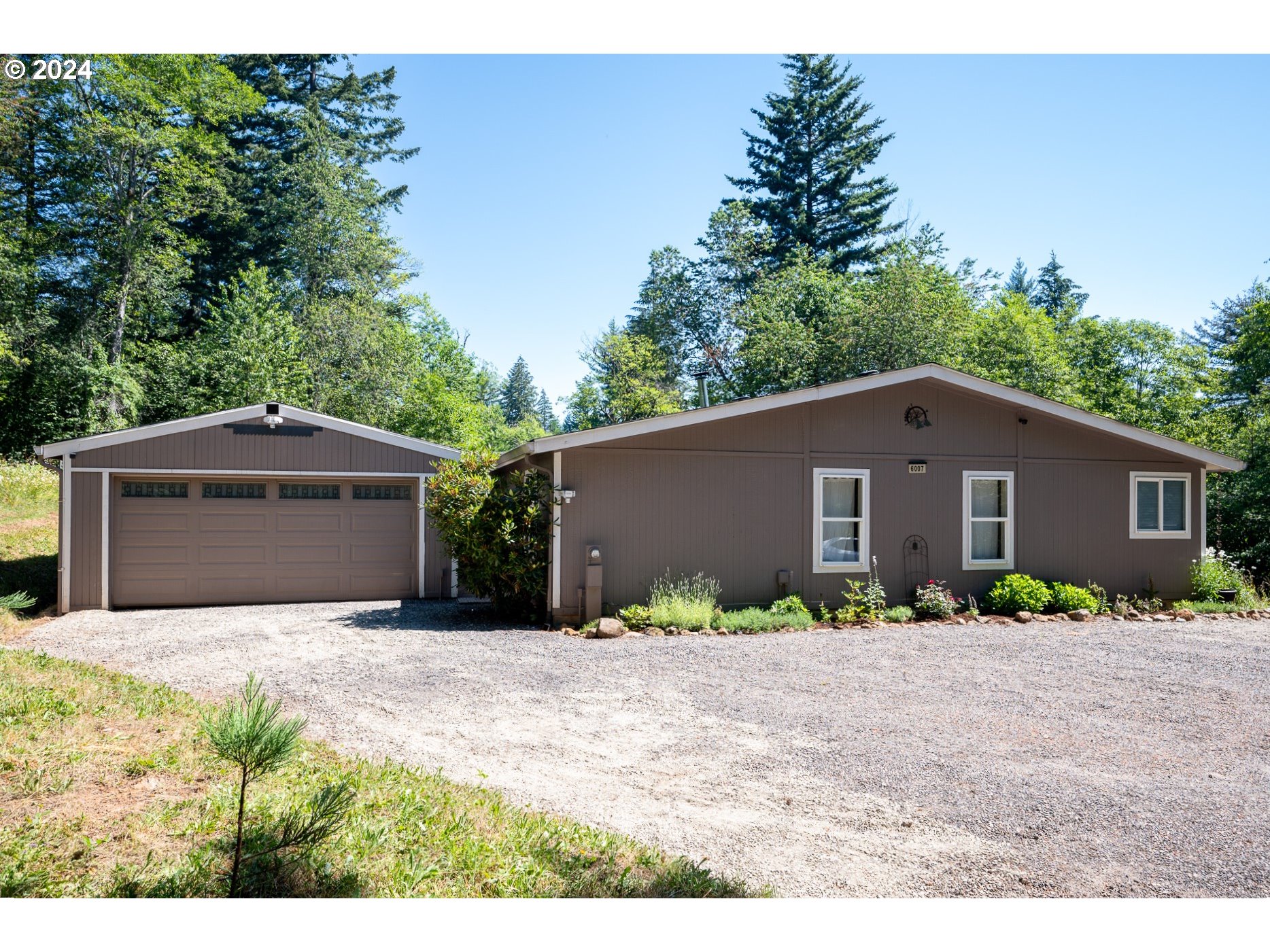 6007 Northeast Lessard Road Camas, WA 98607 - Photo 6 of 48 a front view of house with yard