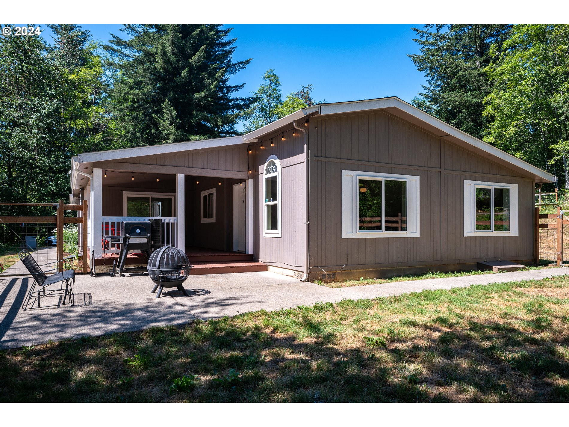 6007 Northeast Lessard Road Camas, WA 98607 - Photo 8 of 48 a view of house with backyard and garden