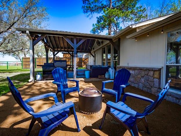 1957 Deer Trail Road Graford, TX 76449 - Photo 25 of 32 a table and chairs in patio of the house