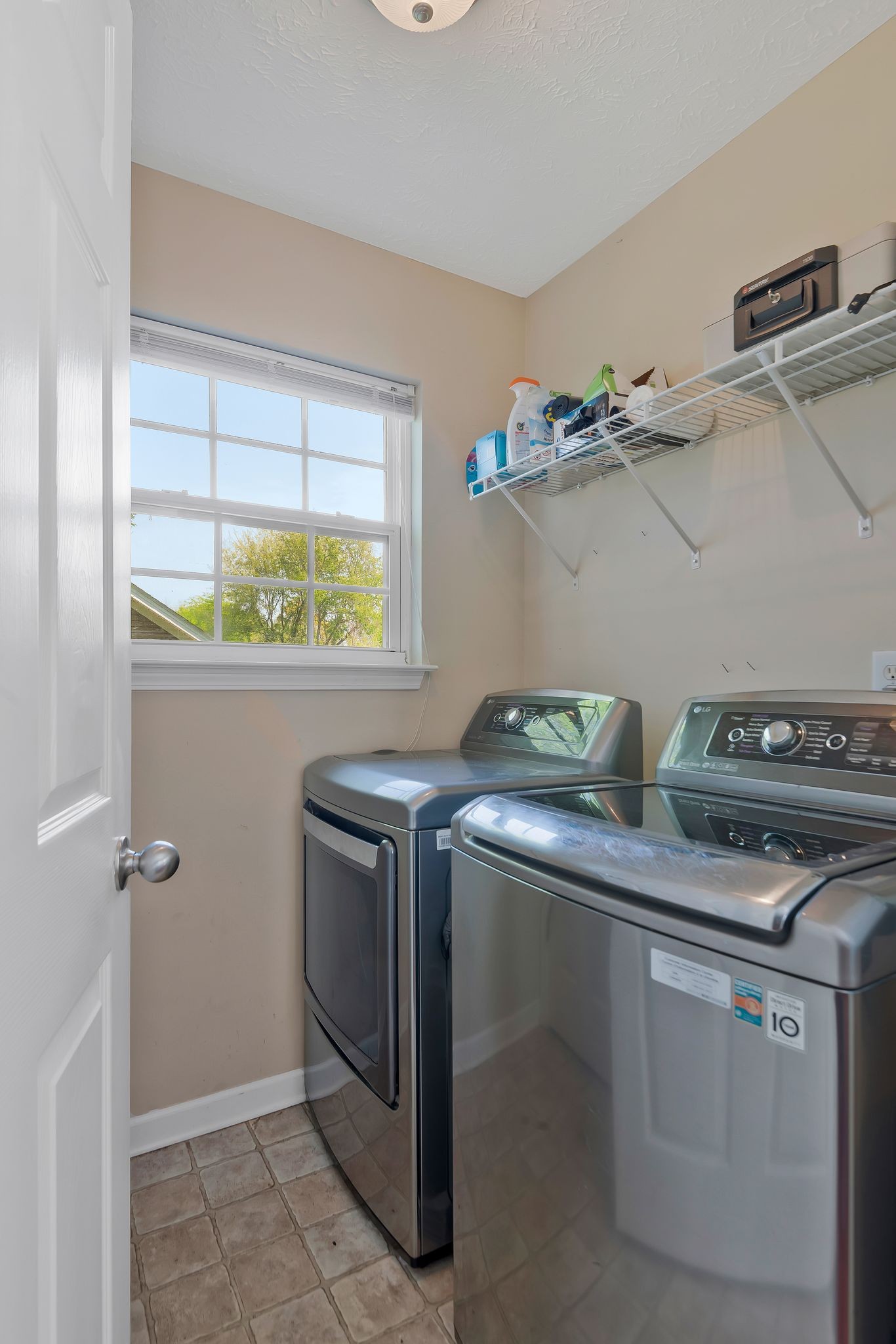 1902 Portway Road Spring Hill, TN 37174 - Photo 18 of 34 a utility room with stove and window