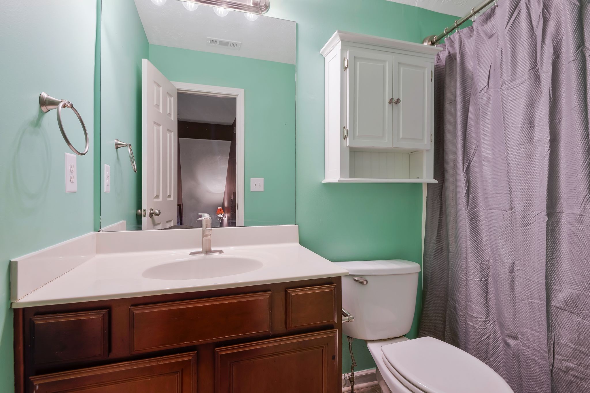 1902 Portway Road Spring Hill, TN 37174 - Photo 27 of 34 a bathroom with a sink a toilet and shower