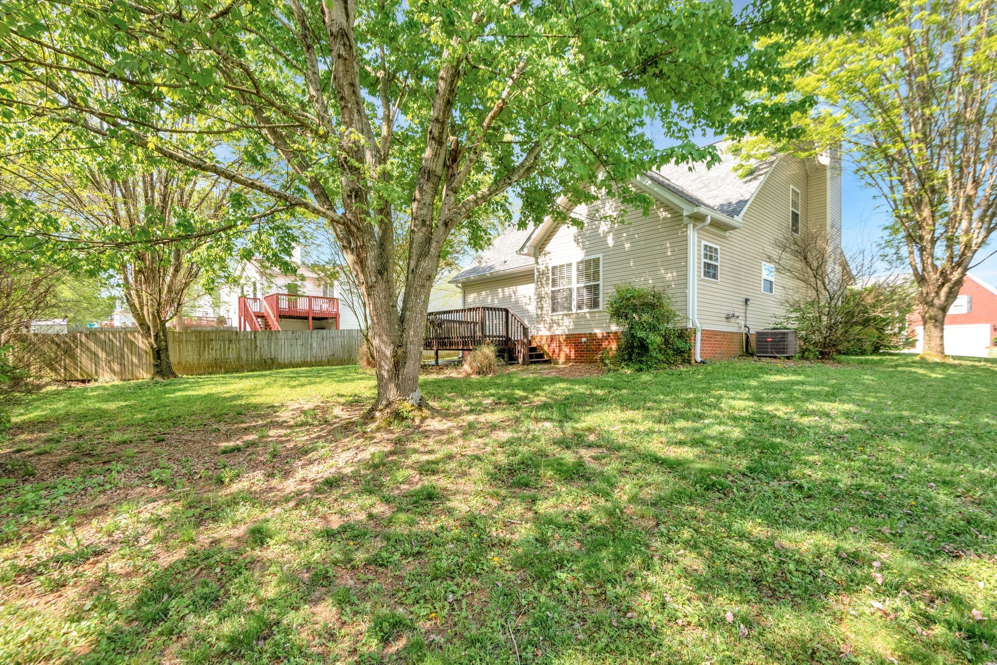 1902 Portway Road Spring Hill, TN 37174 - Photo 32 of 34 a view of a house with a tree in a yard
