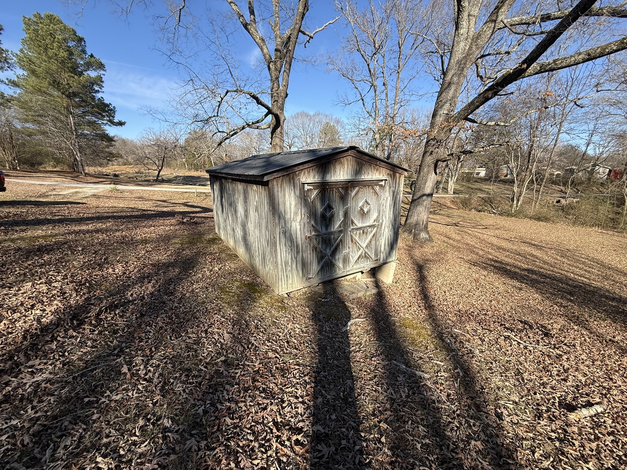 153 Lucas Road Eva, TN 38333 - Photo 3 of 10 a view of a yard with wooden fence