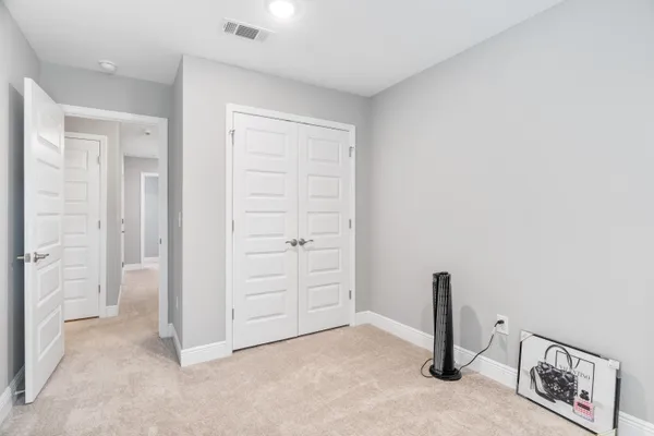 an empty room with closet