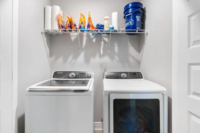 a utility room with dryer and washer