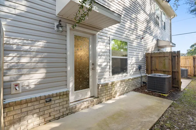 a view of a entryway door of the house with outdoor space