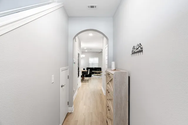 a view of a livingroom with wooden floor