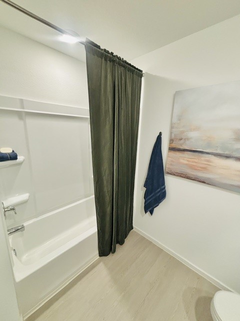 2126 Mosaic Vly Court Angleton, TX 77515 - Photo 21 of 40 a view of closet with bathtub and shower