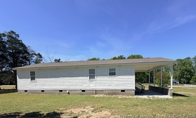 250 Trapper Run Lane Clinton, NC 28328 - Photo 5 of 22 a view of a house with a yard
