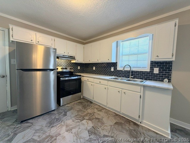 250 Trapper Run Lane Clinton, NC 28328 - Photo 6 of 22 a kitchen with a refrigerator sink and cabinets