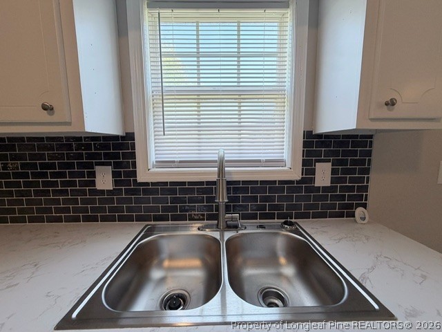 250 Trapper Run Lane Clinton, NC 28328 - Photo 9 of 22 a bathroom with a sink and a window