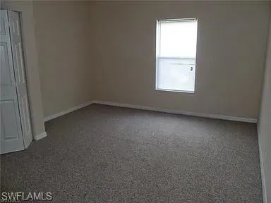 a bath tub sitting next to a window