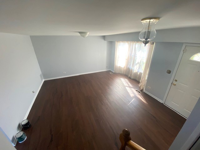 209 North Southport Road Mundelein, IL 60060 - Photo 5 of 18 wooden floor in an empty room with a window