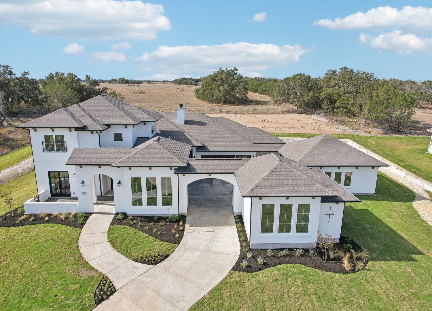3 Bob Wire Road Spicewood, TX 78669 - Photo 2 of 27 Sitterle Homes can provide a custom, semi-custom or choice of already created plan for you to build.